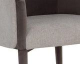 Sheva Dining Chair With Upholstered Legs and Barrel Back