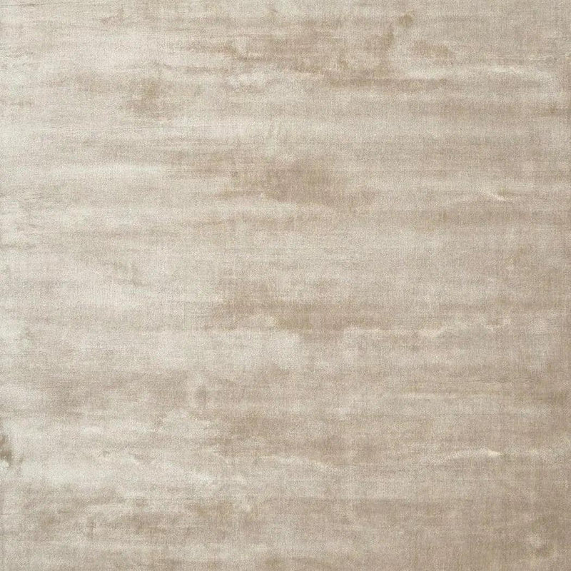 Lucens Beige Solid Handmade Area Rug