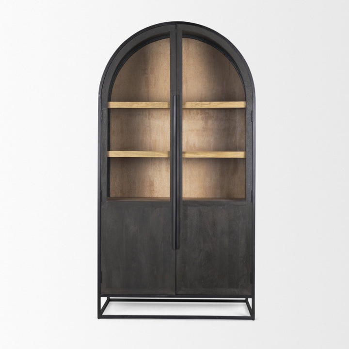 Decorative cabinet with arched glass doors on a white background