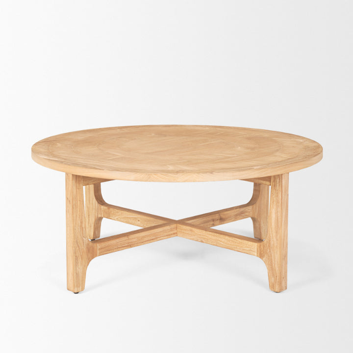 Round wooden coffee table on a white background